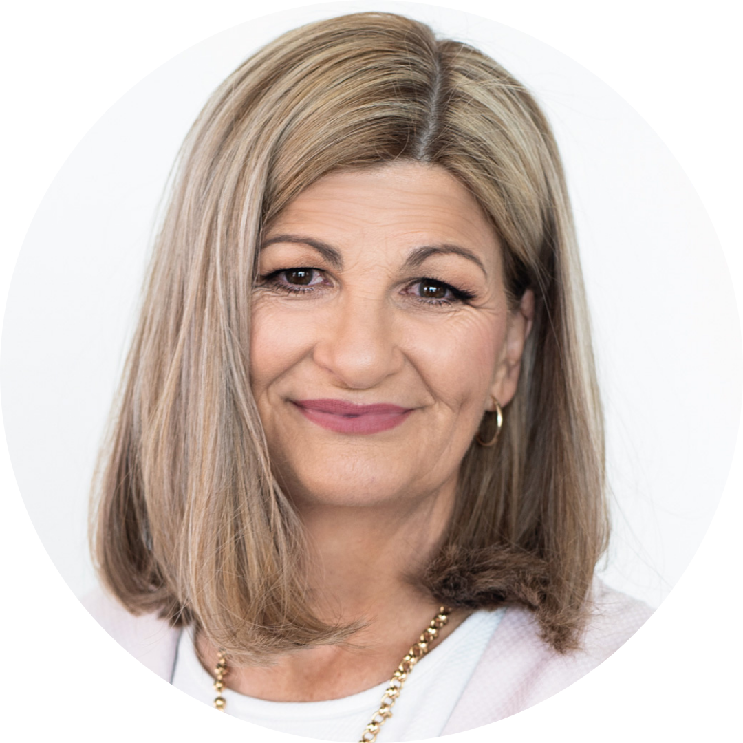Portrait of middle aged woman with blonde bob