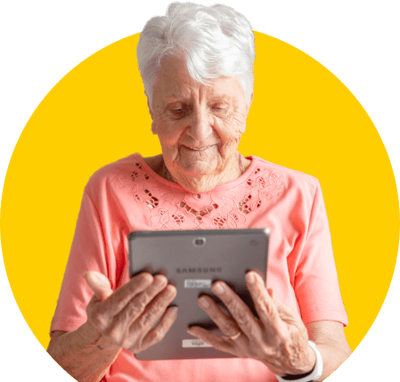 Joyce holding a tablet